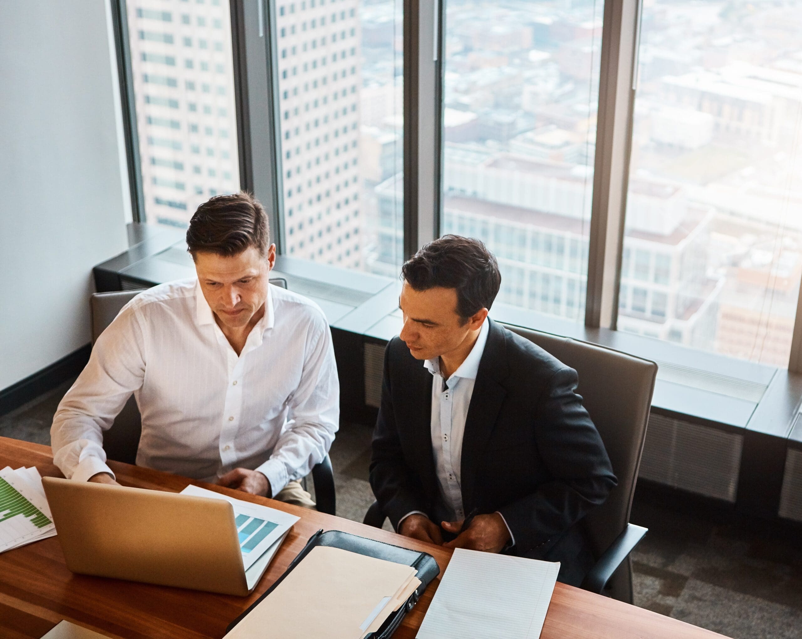 Manager and employee discussing performance.