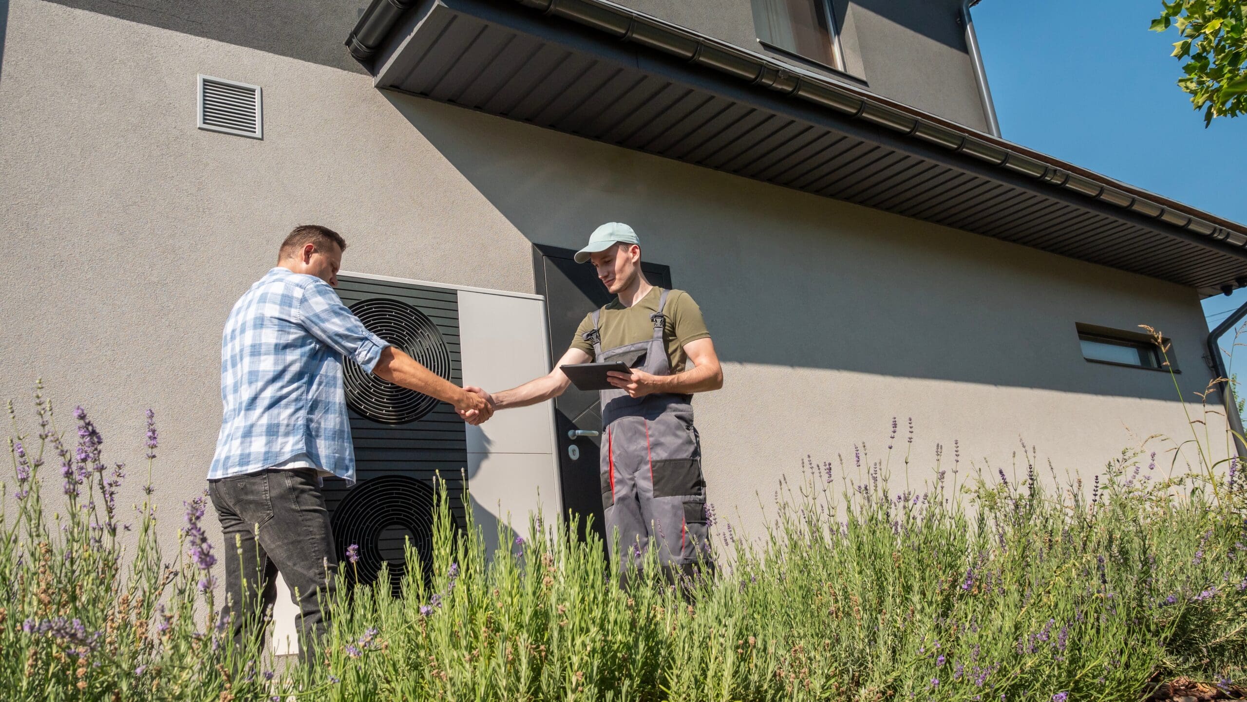 HVAC Contractor and homeowner shaking hands